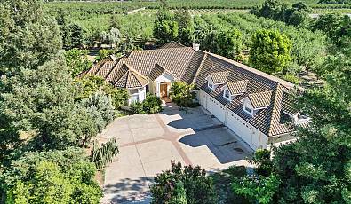 Luxurious Mediterranean Mansion on Sprawling 9.83 Acres with Guest House and Workshops