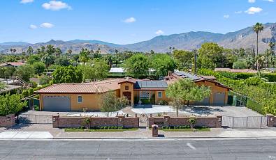 gated custom-built estate in the heart of Palm Springs: a car collector or RV enthusiast's dream!